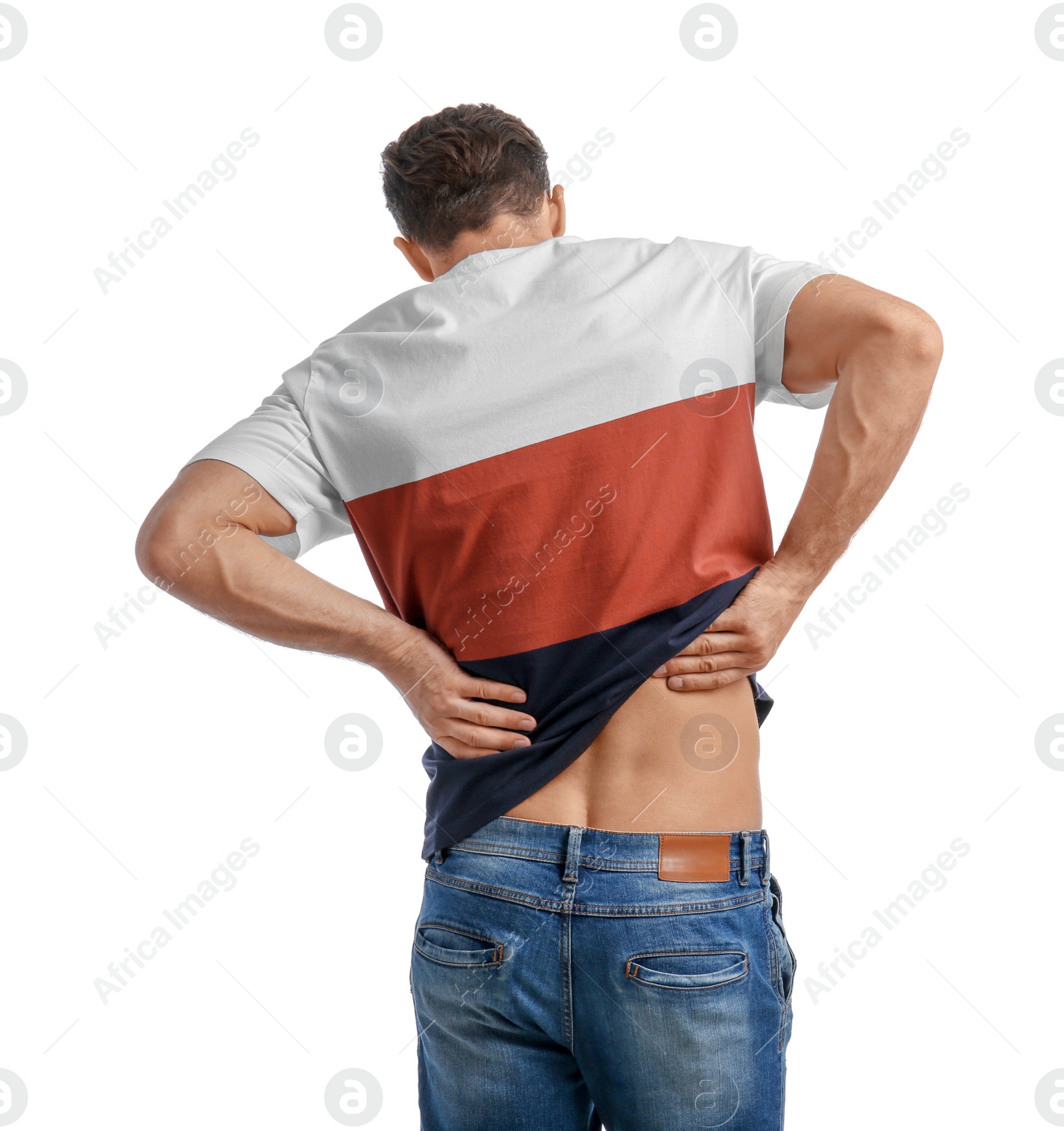 Photo of Young man suffering from back pain on white background