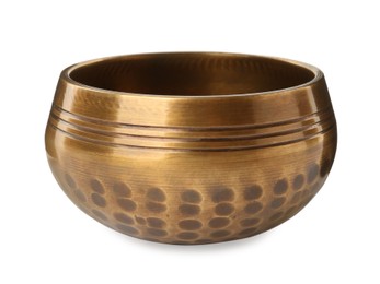 Photo of Golden singing bowl isolated on white. Sound healing