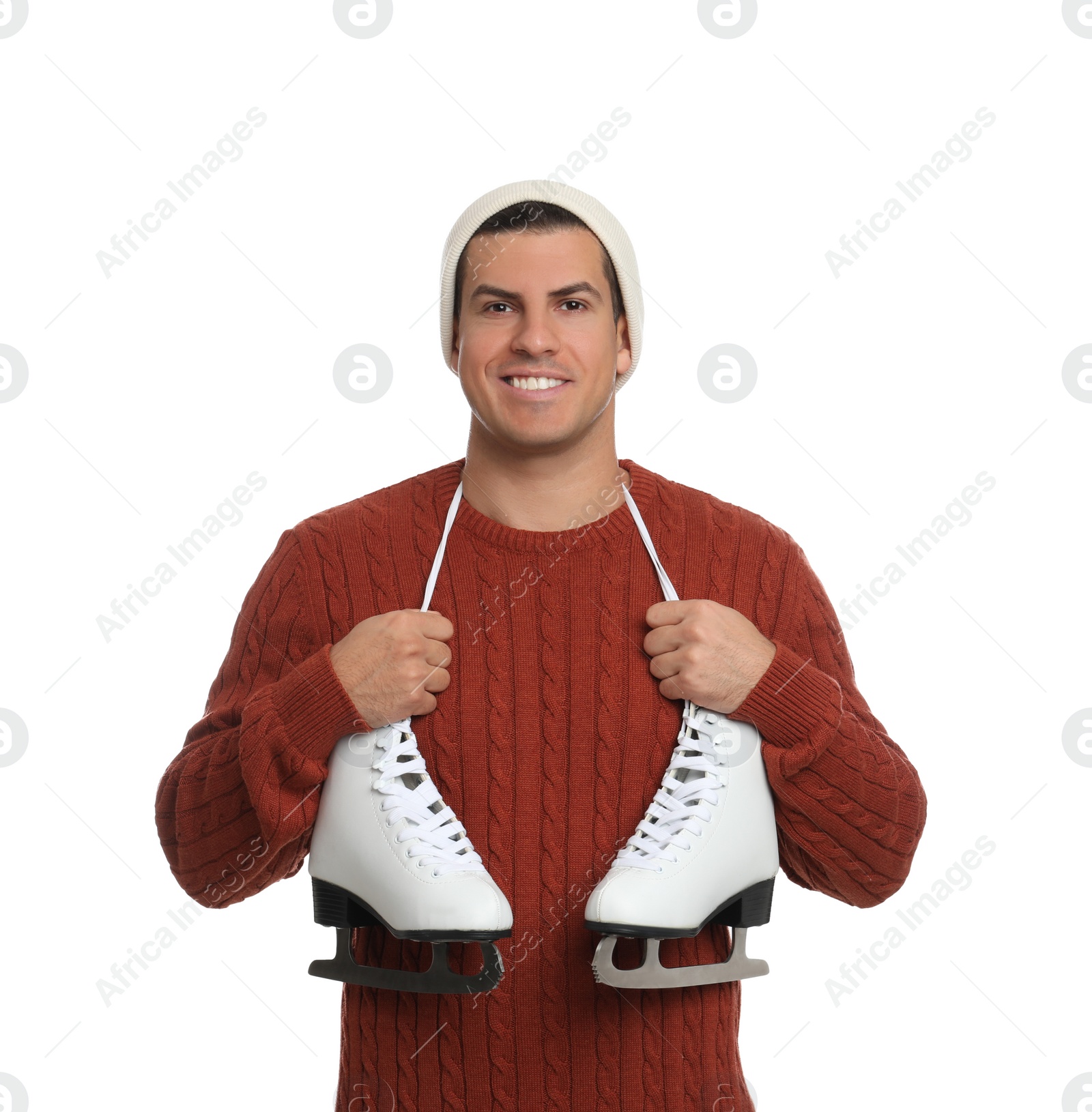 Photo of Happy man with ice skates on white background