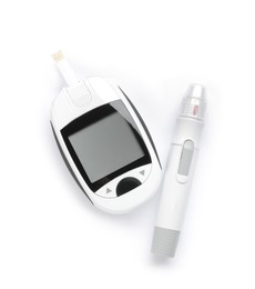 Modern glucometer with test strip and lancet pen on white background, top view