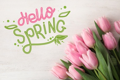 Image of Hello Spring. Beautiful pink tulips on white wooden background, flat lay