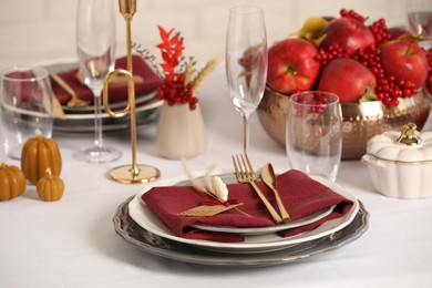 Elegant festive setting with autumn decor on table