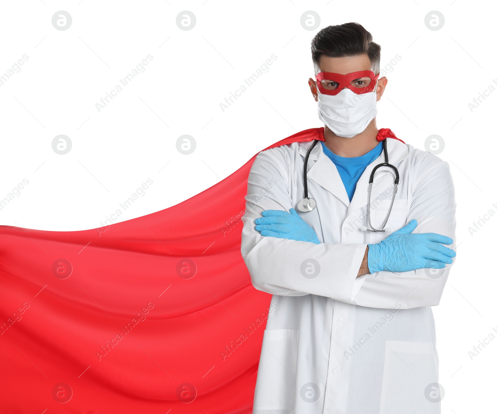 Photo of Doctor wearing face mask and cape on white background. Super hero power for medicine