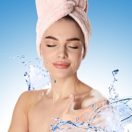 Beautiful young woman and splashing water on color background. Spa portrait
