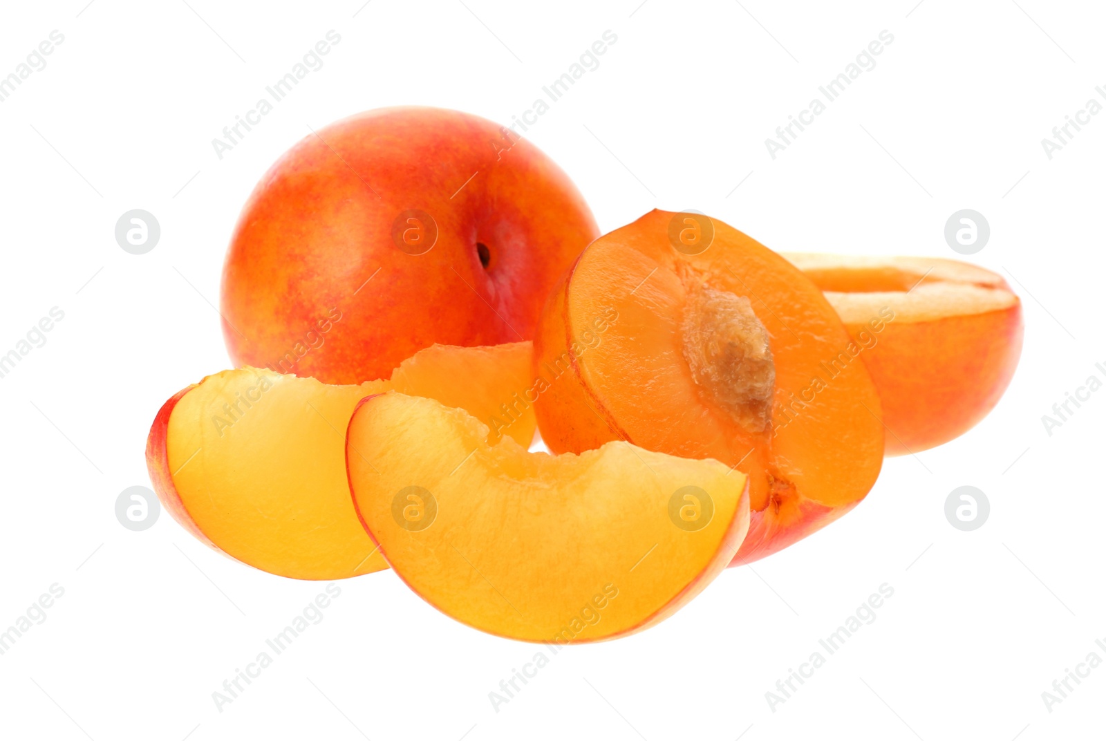 Photo of Whole and cut ripe plums isolated on white