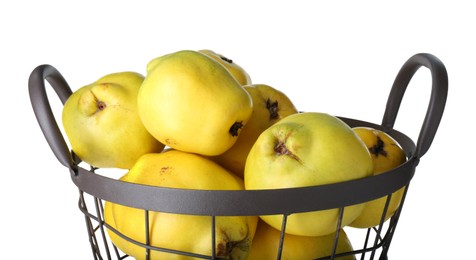 Photo of Basket with delicious fresh ripe quinces isolated on white