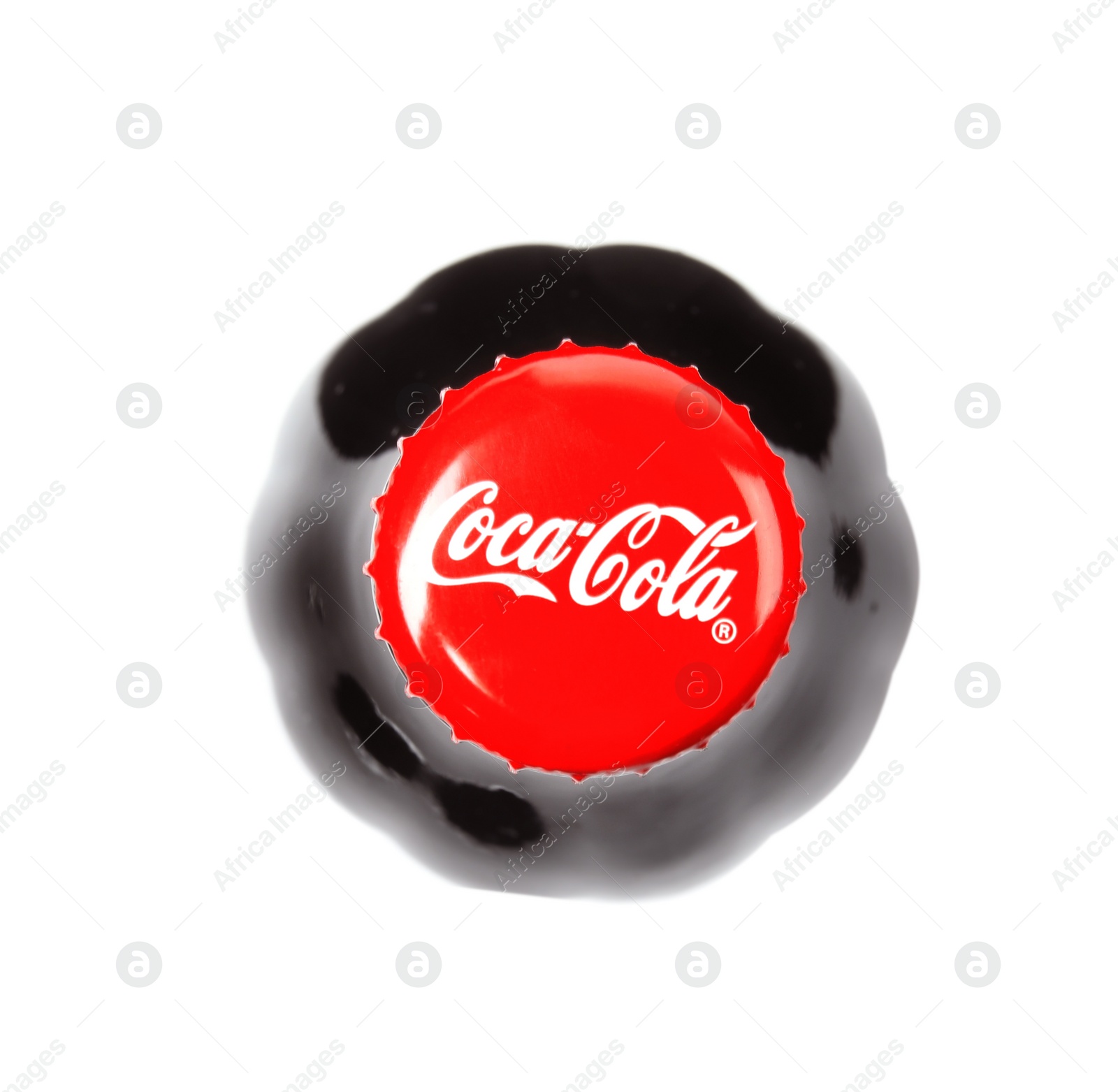 Photo of MYKOLAIV, UKRAINE - NOVEMBER 15, 2018: Bottle of Coca Cola on white background, top view