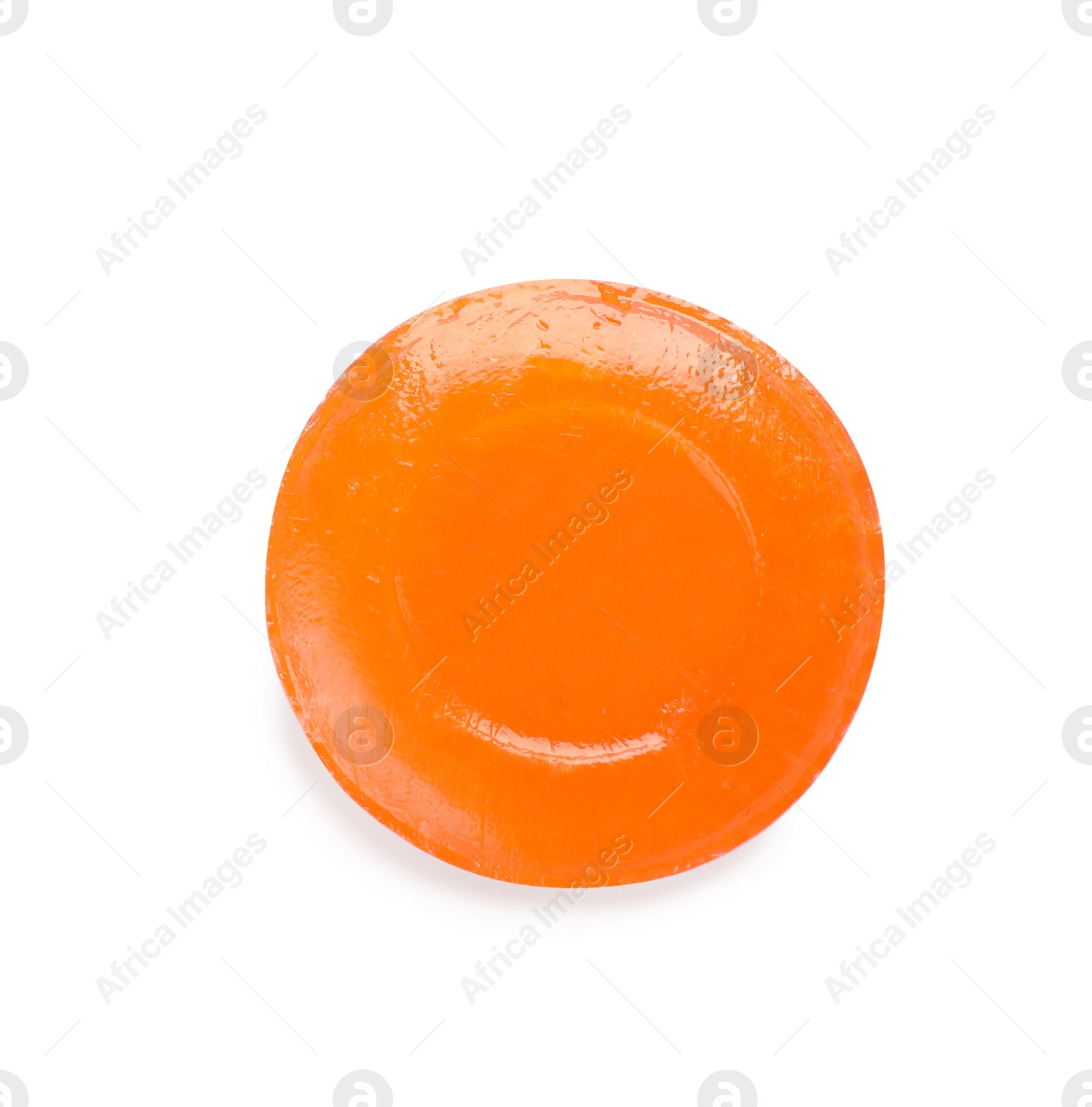 Photo of One orange cough drop isolated on white, top view