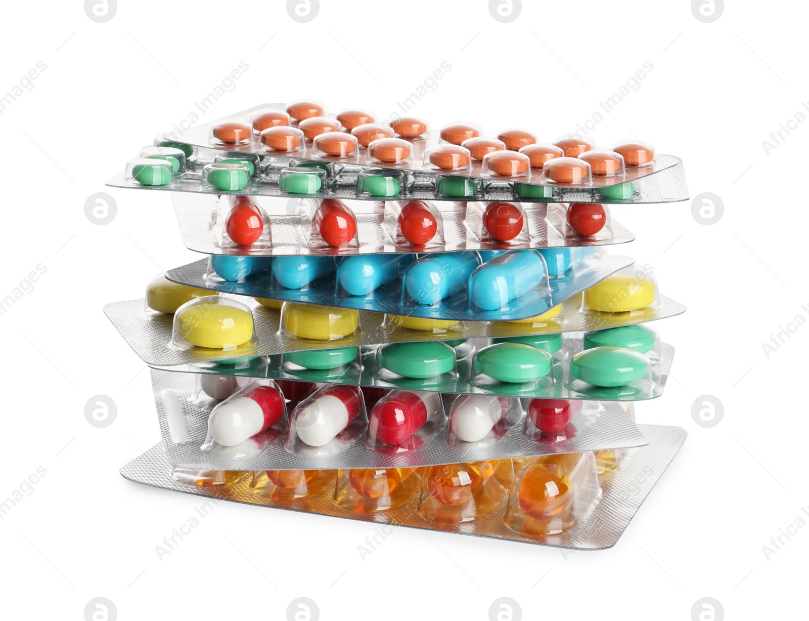 Photo of Stack of blisters with different pills on white background