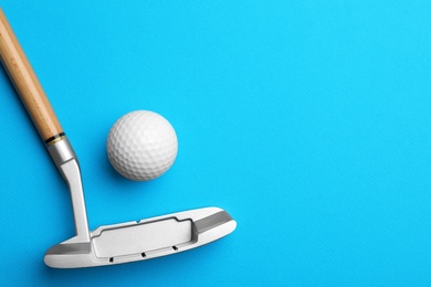 Photo of Golf ball and club on color background, flat lay. Space for text