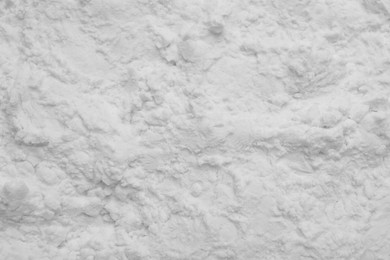 Photo of Heap of natural starch as background, top view