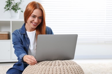 Woman having video chat via laptop at home, space for text