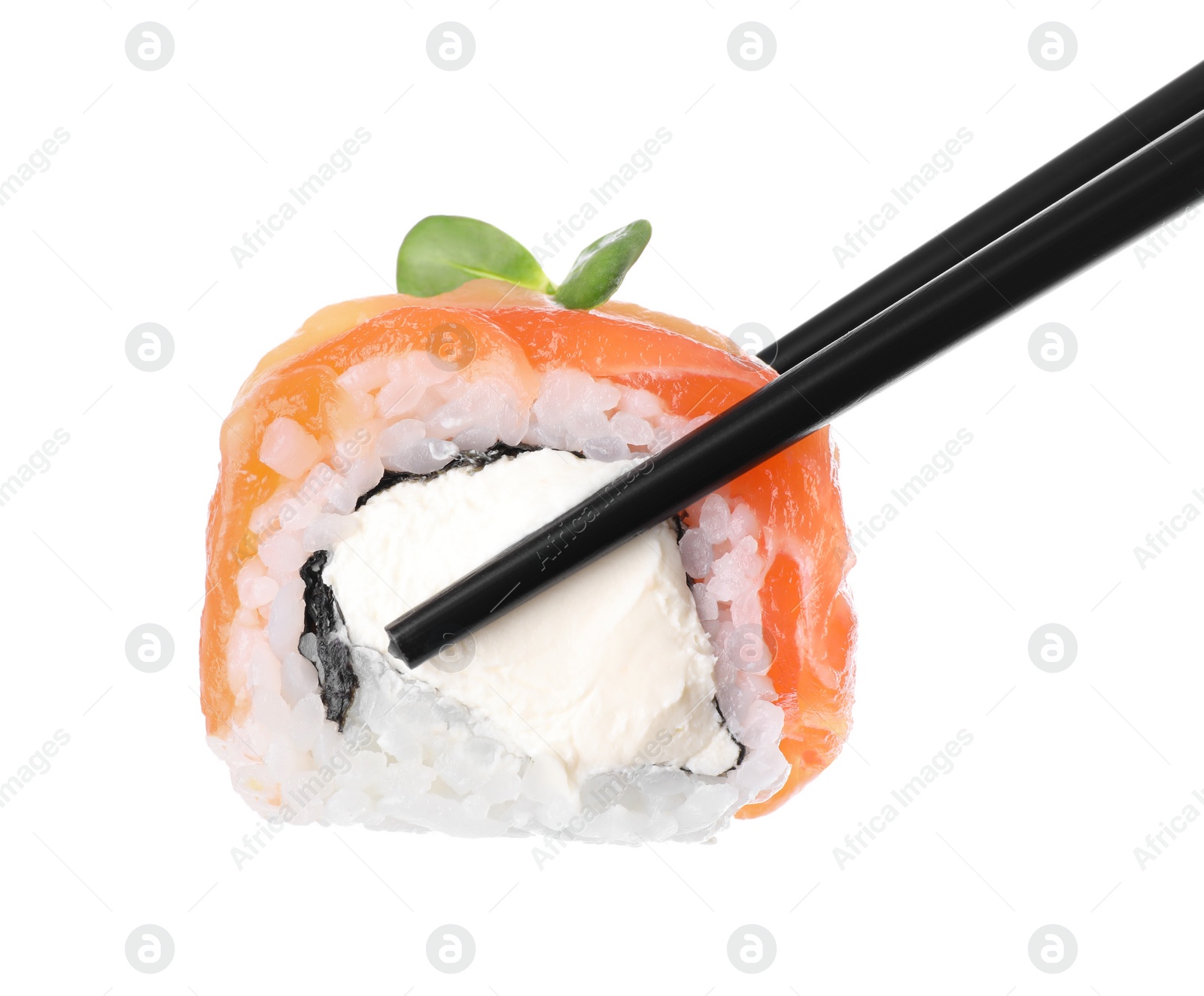 Photo of Holding sushi roll with chopsticks on white background, closeup