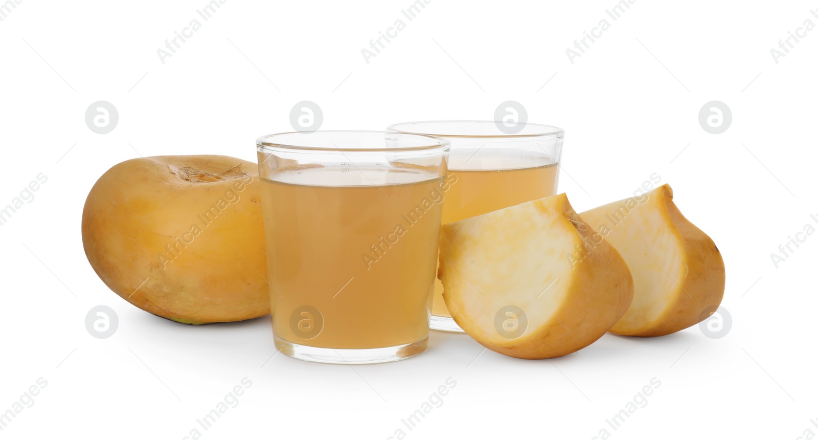 Photo of Glasses of freshly made turnip juice on white background