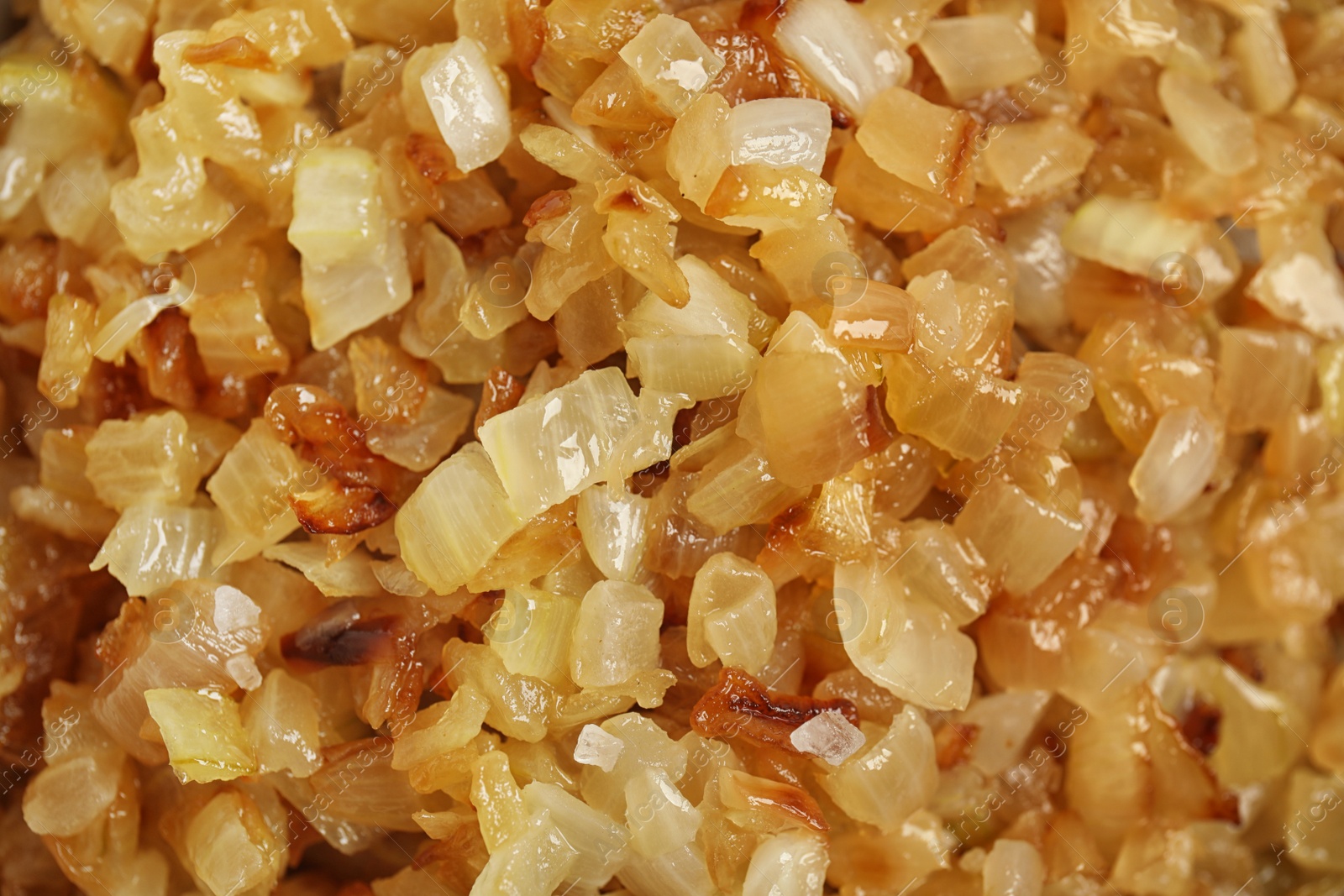 Photo of Tasty fried onion as background, top view