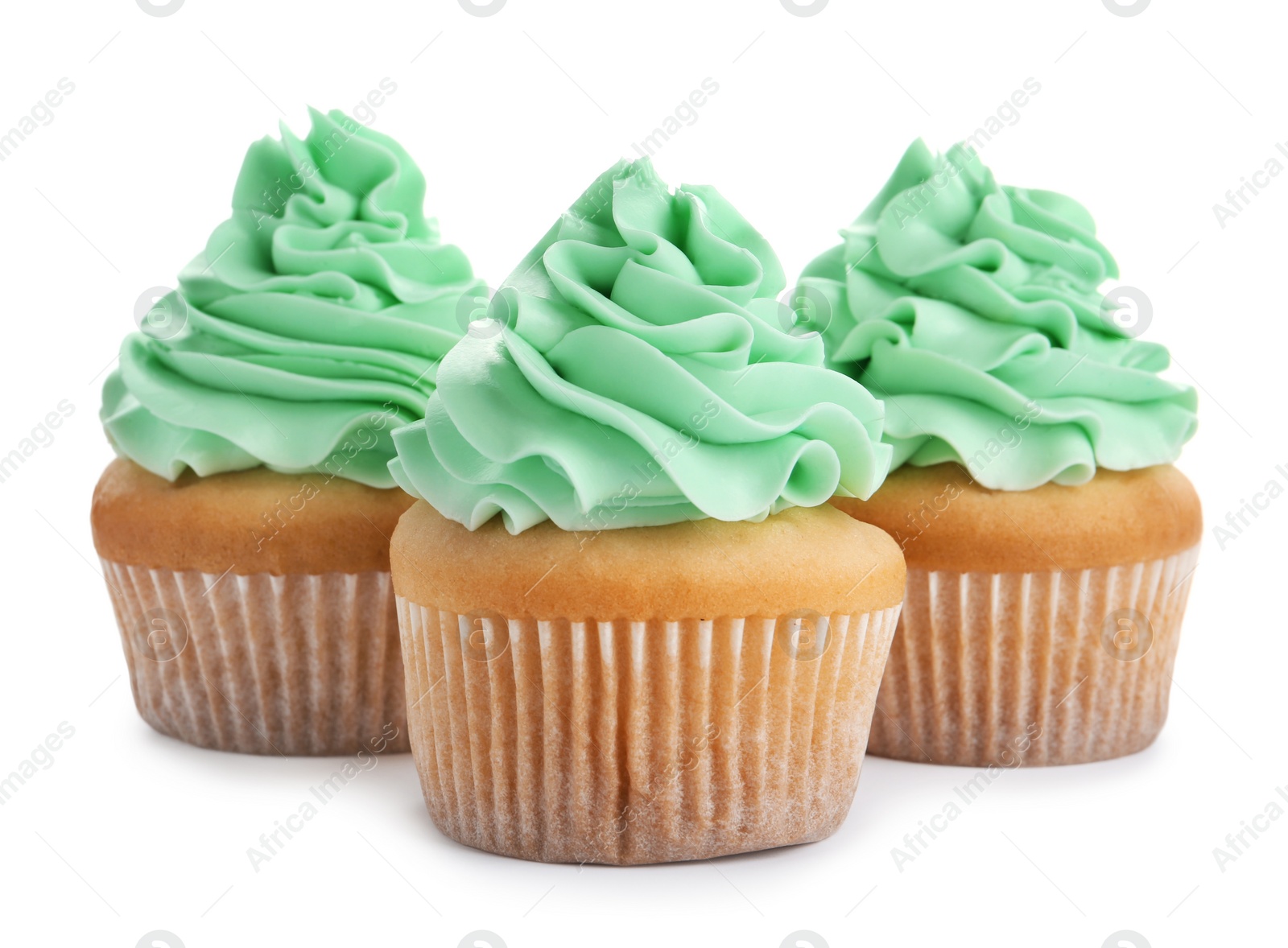 Photo of Delicious cupcakes with cream on white background