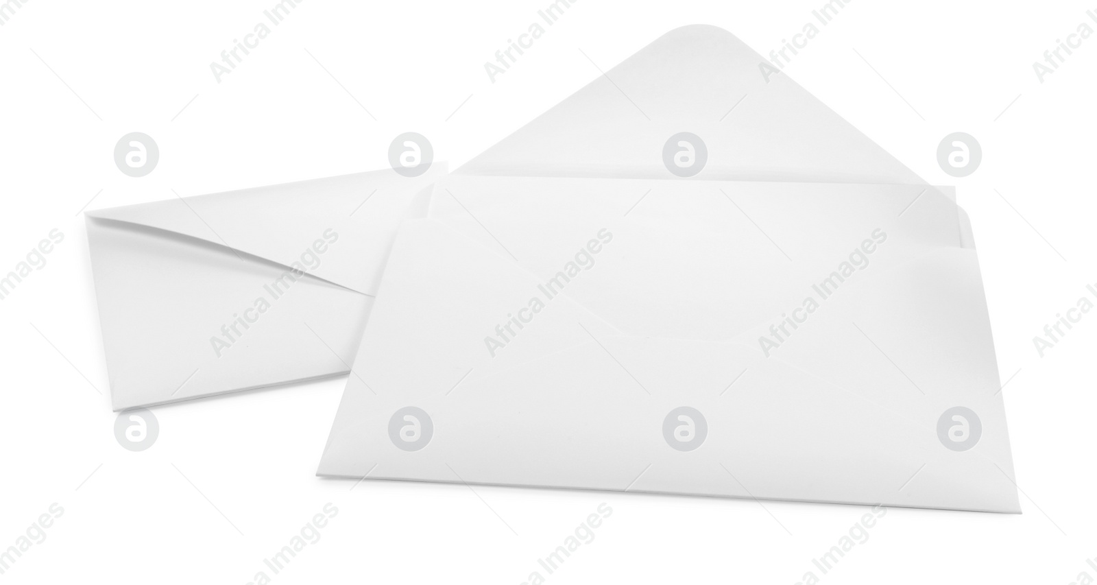 Photo of Two simple paper envelopes on white background