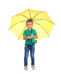 Photo of Little boy with yellow umbrella on white background