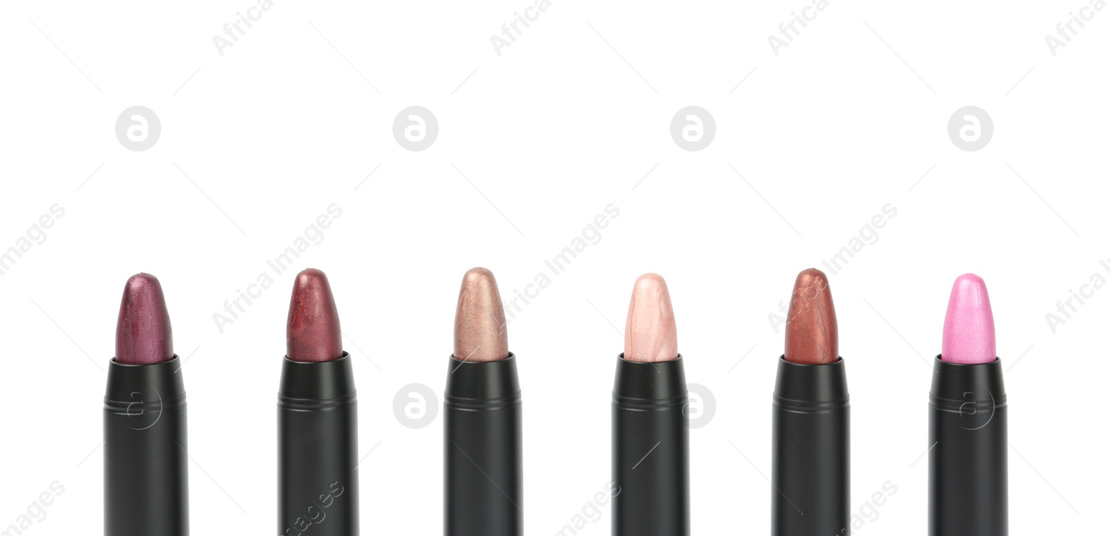 Photo of Set of colorful lipsticks isolated on white