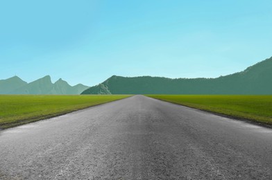 Empty asphalt road in mountains. Picturesque landscape