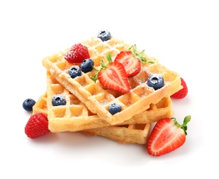 Photo of Delicious waffles with berries on white background