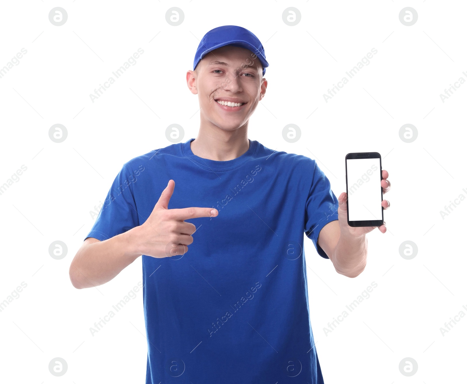 Photo of Happy courier pointing at smartphone on white background