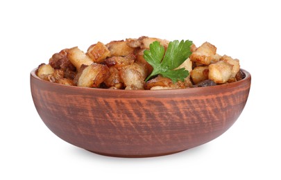 Photo of Tasty fried cracklings with parsley in bowl on white background. Cooked pork lard