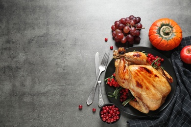 Photo of Flat lay composition with turkey on grey background, space for text. Happy Thanksgiving day