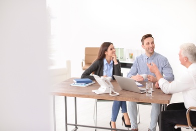 Human resources commission conducting job interview with applicant in office