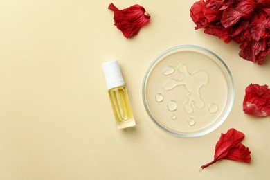 Photo of Petri dish with cosmetic product and flowers on beige background, flat lay. Space for text
