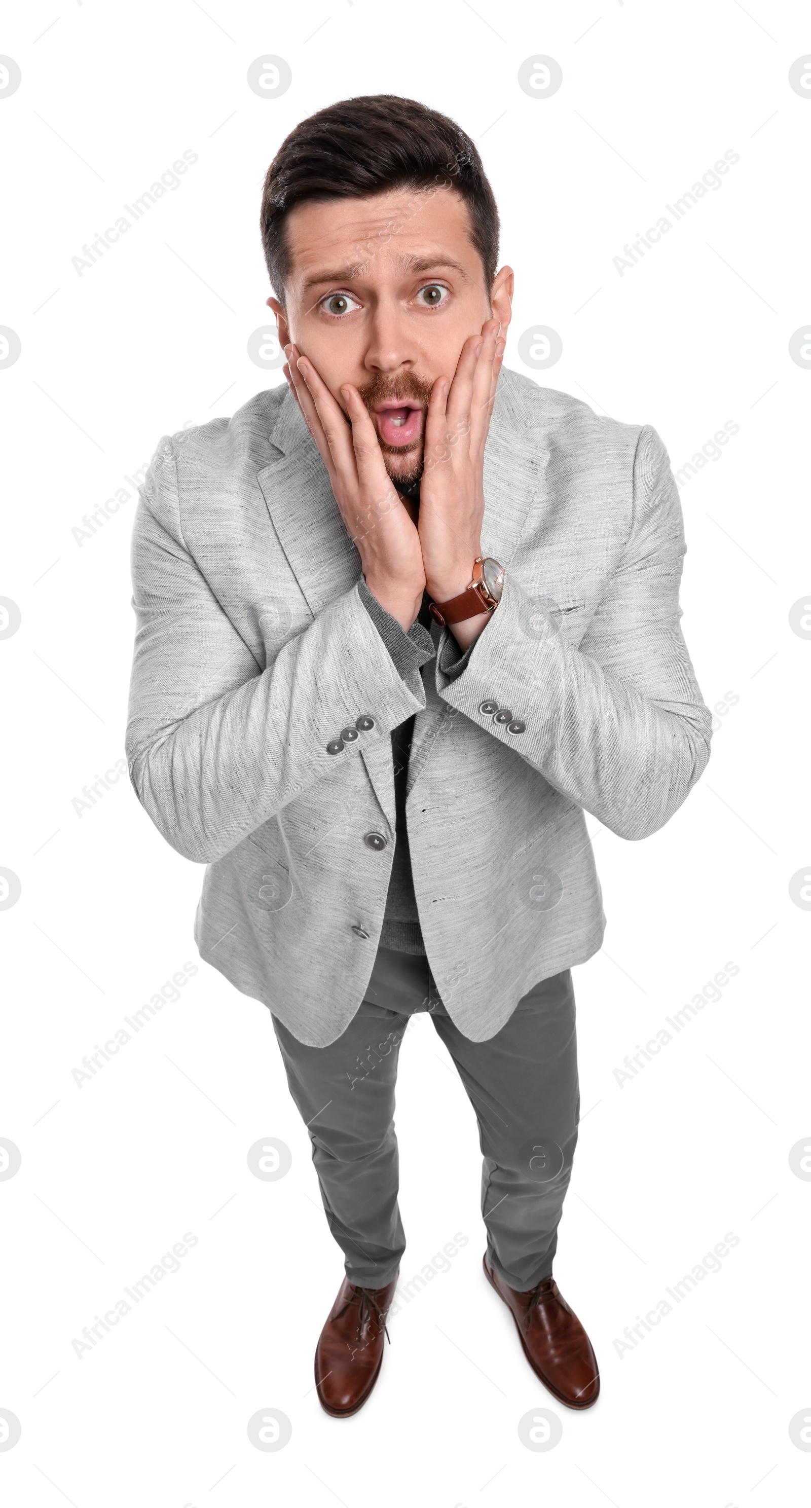 Photo of Emotional bearded businessman in suit on white background, above view