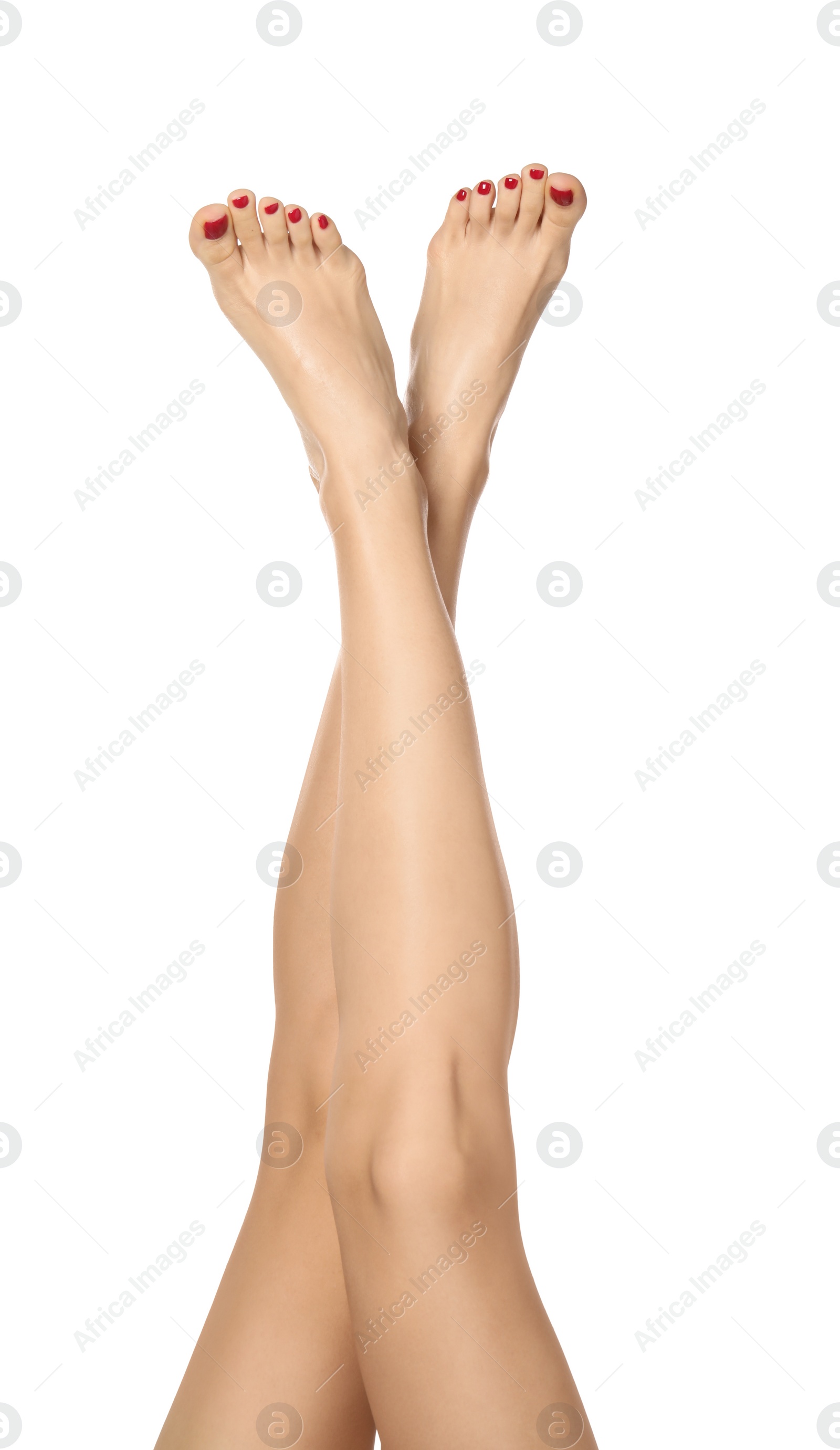 Photo of Woman with stylish red toenails after pedicure procedure isolated on white, closeup