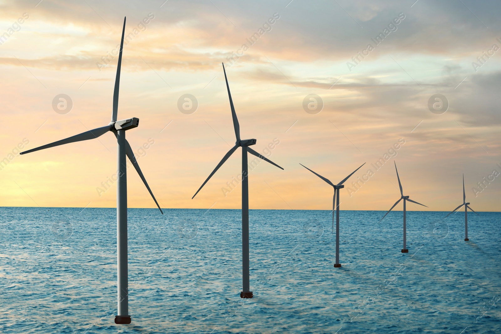 Image of Floating wind turbines installed in sea. Alternative energy source 