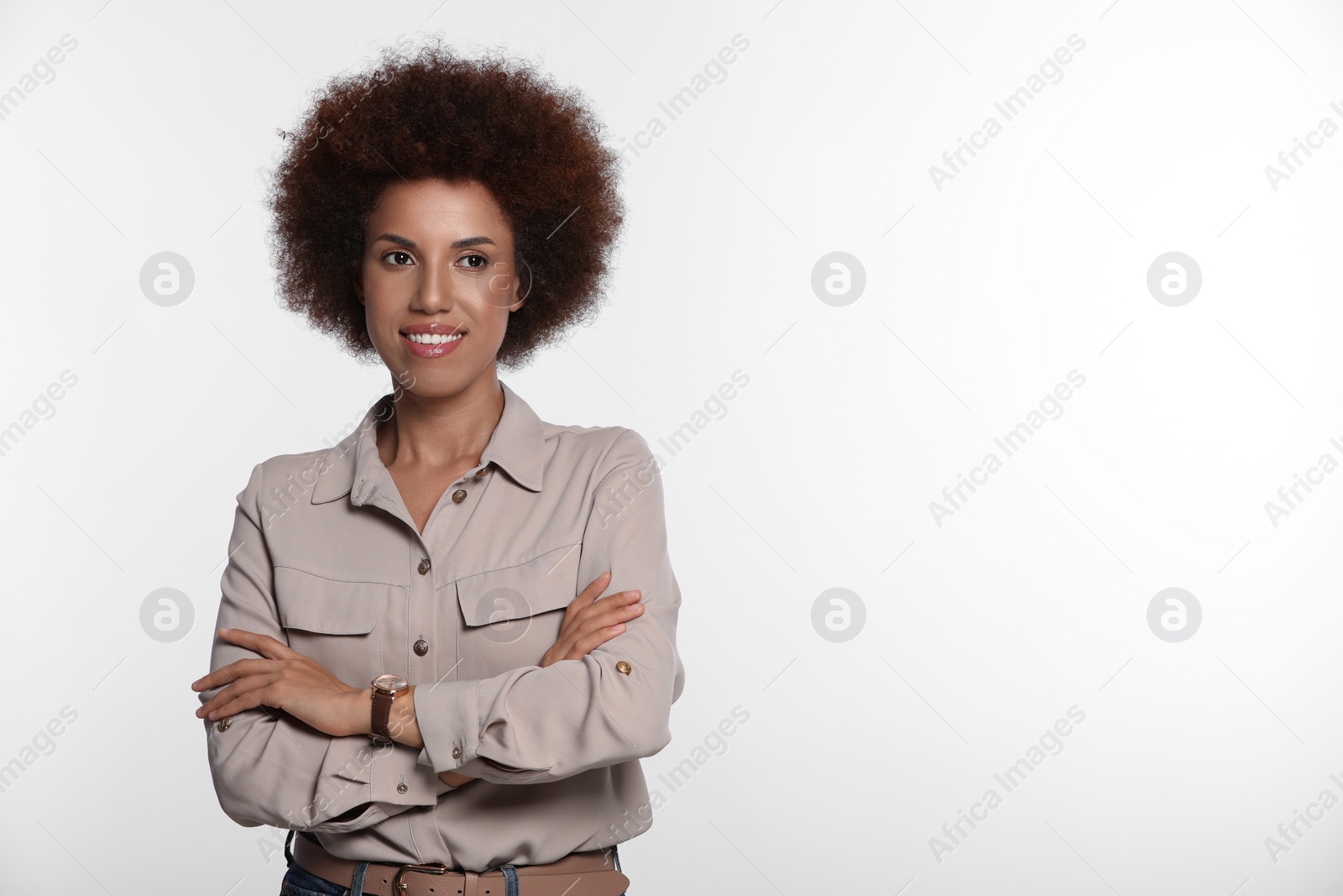 Photo of Portrait of beautiful young woman in stylish blouse on white background. Space for text