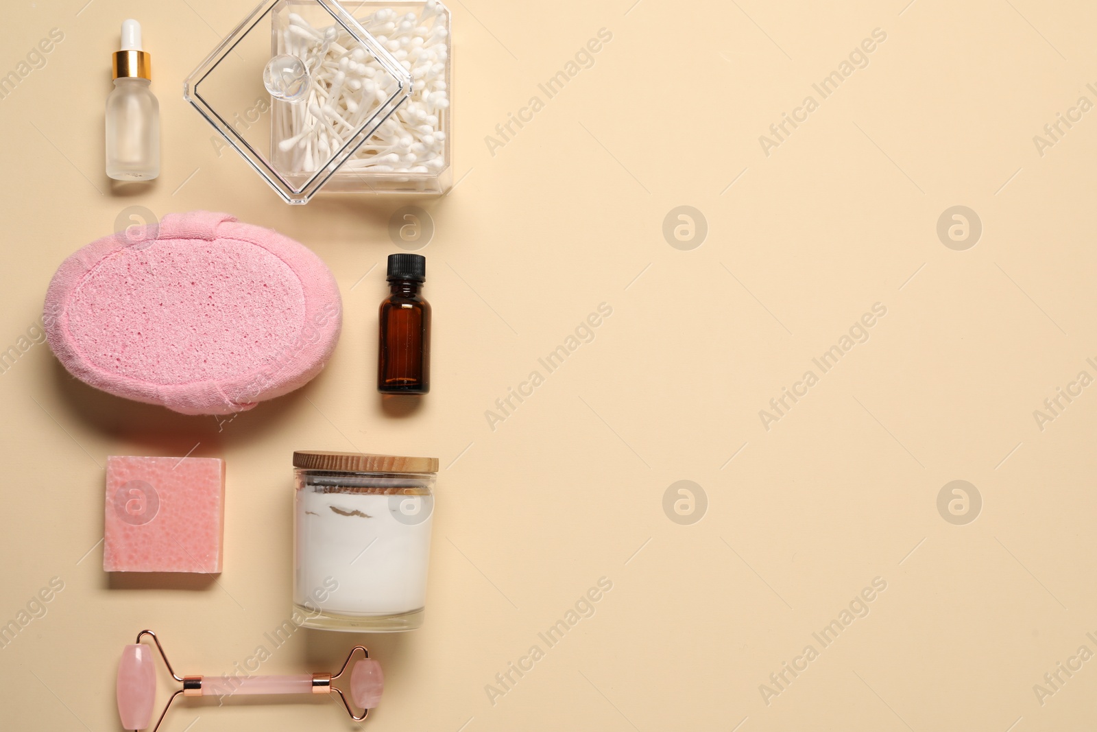 Photo of Bath accessories. Flat lay composition with personal care products on beige background, space for text