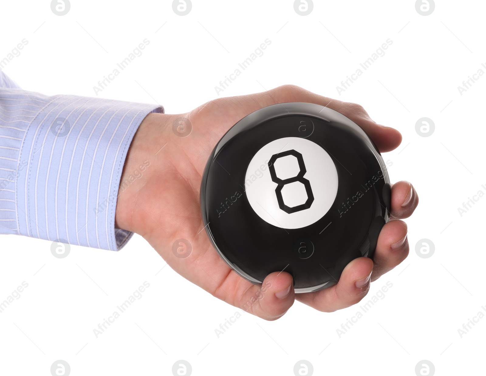 Photo of Man holding magic eight ball on white background, closeup