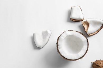 Photo of Ripe coconut on white background, top view