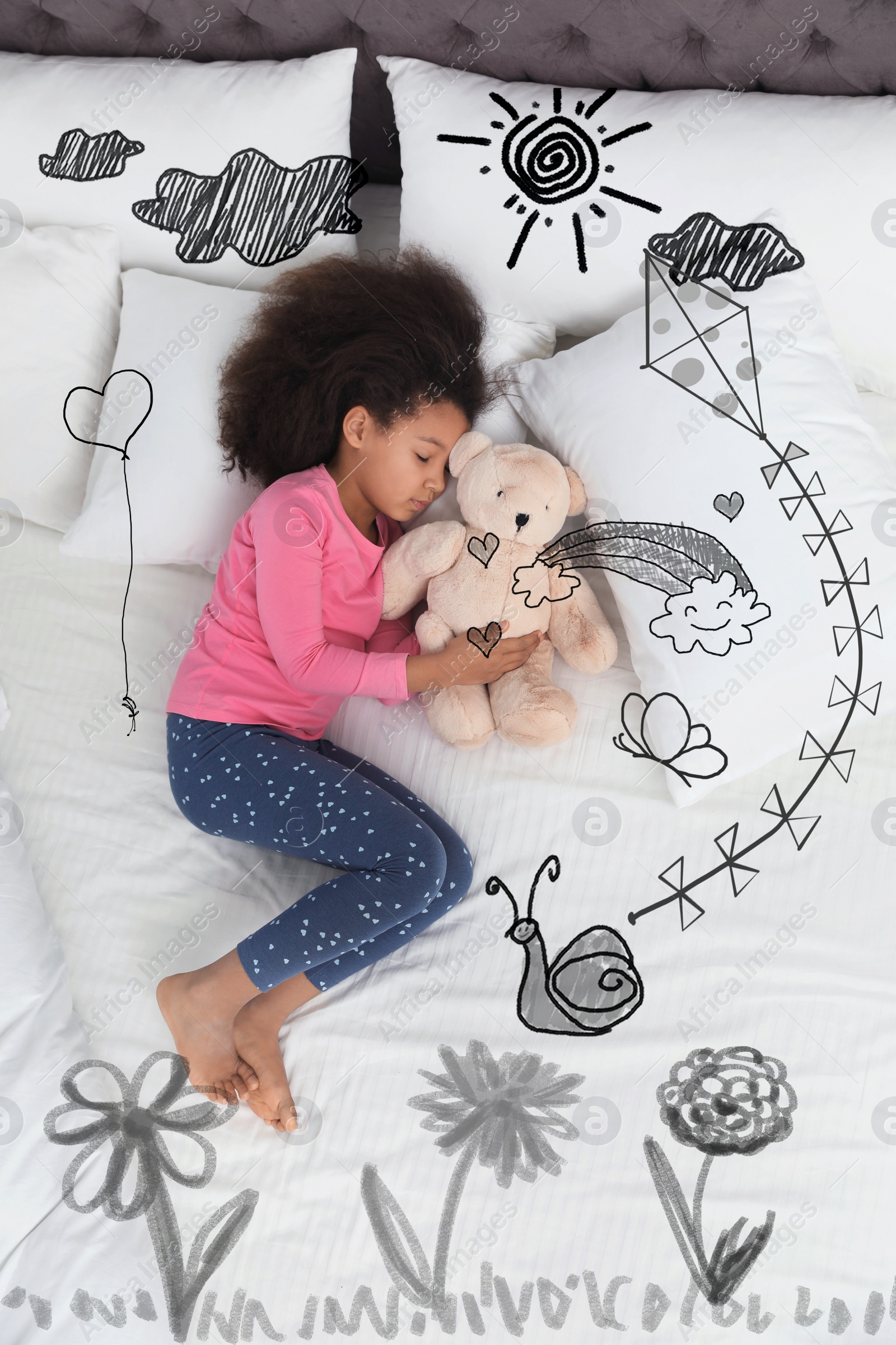 Image of Sweet dreams. Cute African American girl sleeping, above view. Sun, kite and other illustrations on foreground