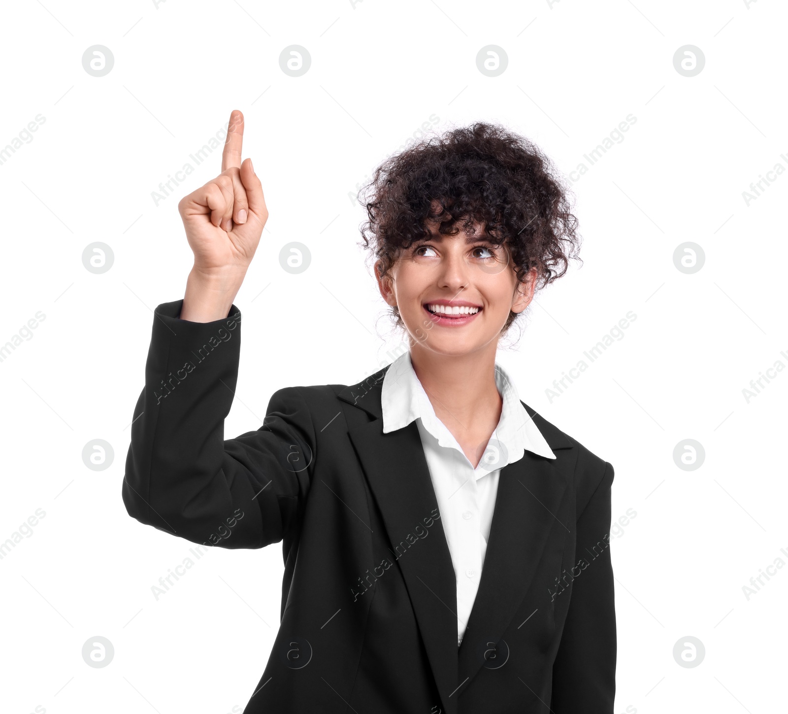 Photo of Beautiful happy businesswoman pointing at something on white background