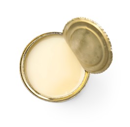 Photo of Open tin can with condensed milk isolated on white, top view