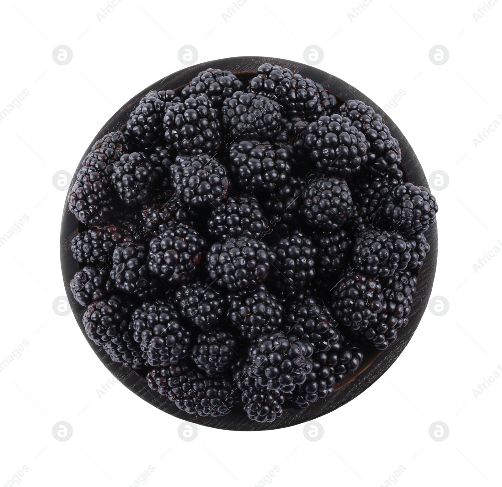 Photo of Fresh ripe blackberries in wooden bowl isolated on white, top view