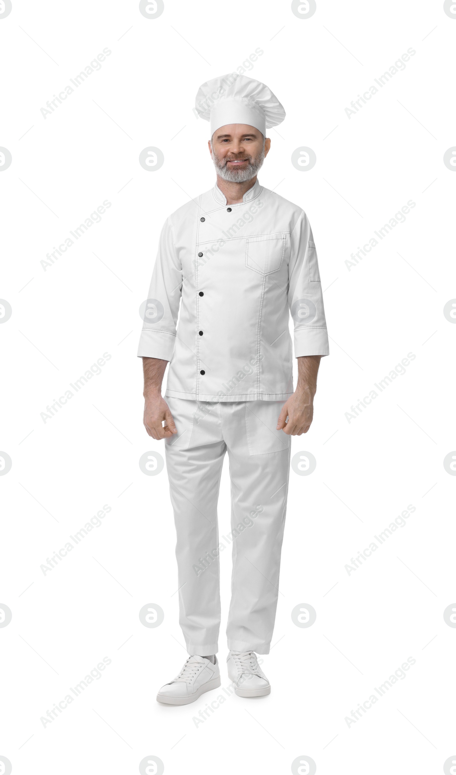 Photo of Full length portrait of happy chef in uniform on white background