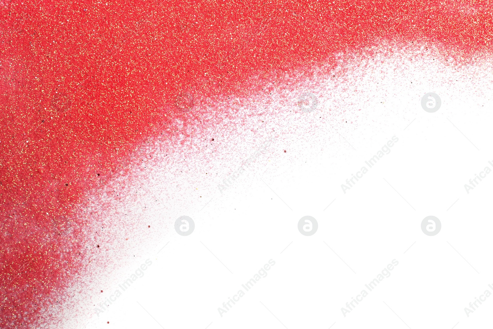 Photo of Red glitter on white background, top view