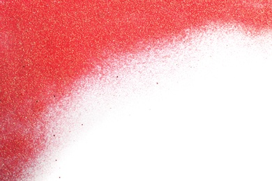 Photo of Red glitter on white background, top view