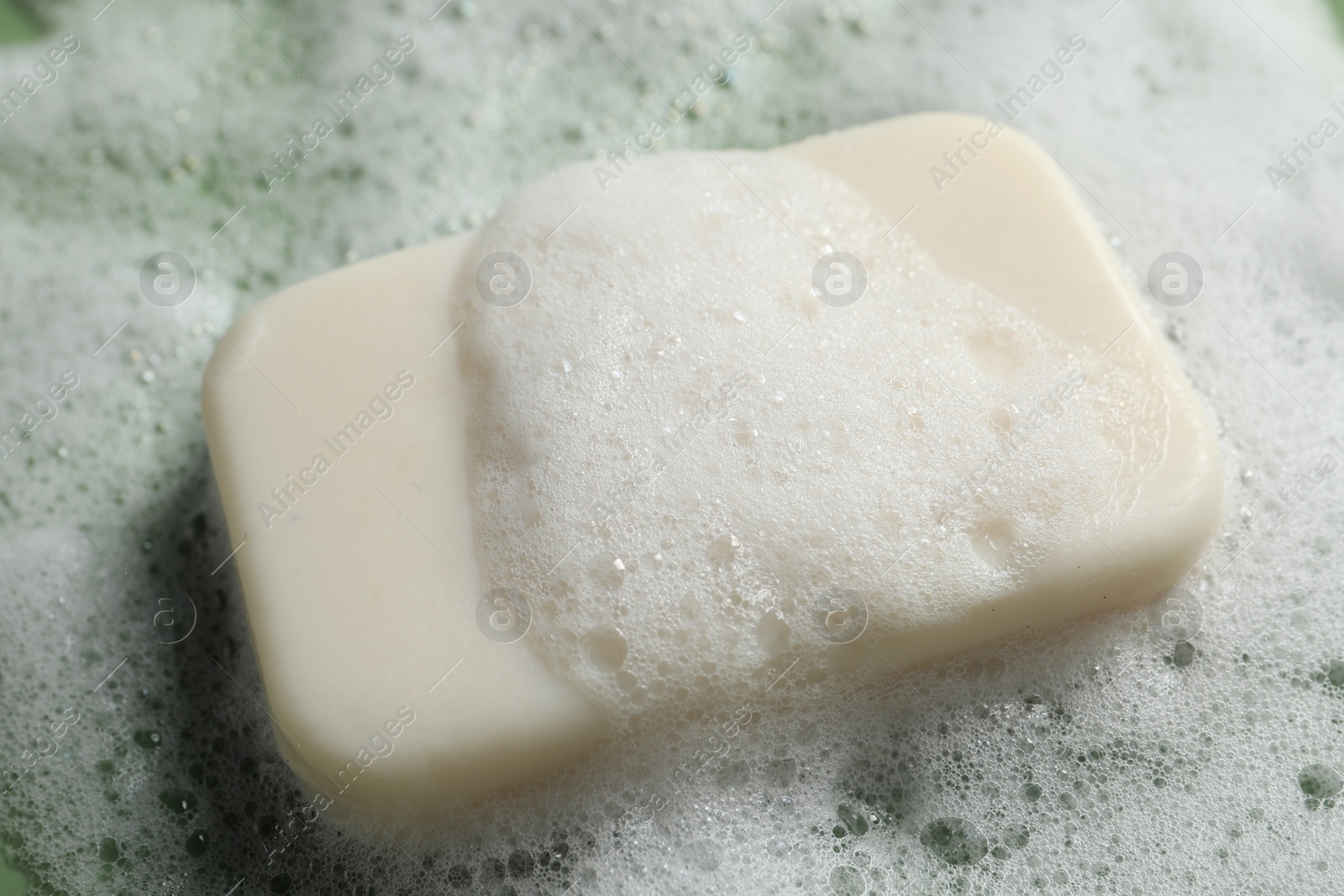 Photo of Closeup view of soap and fluffy foam