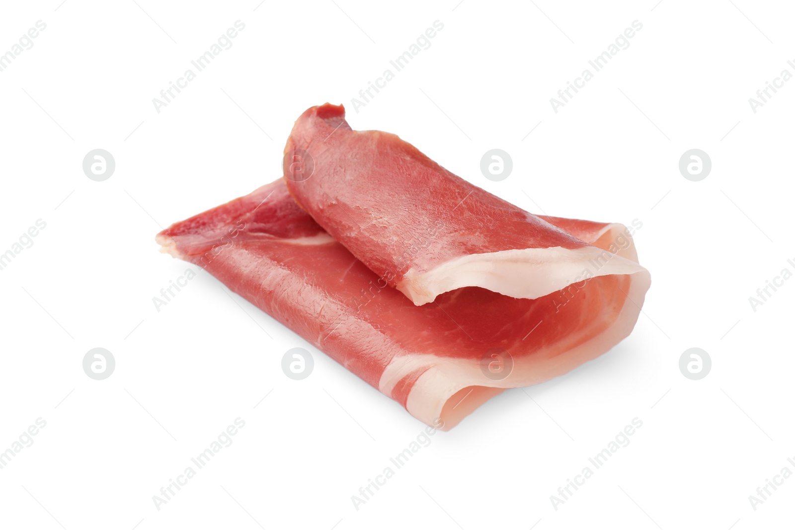 Photo of Slice of tasty jamon isolated on white