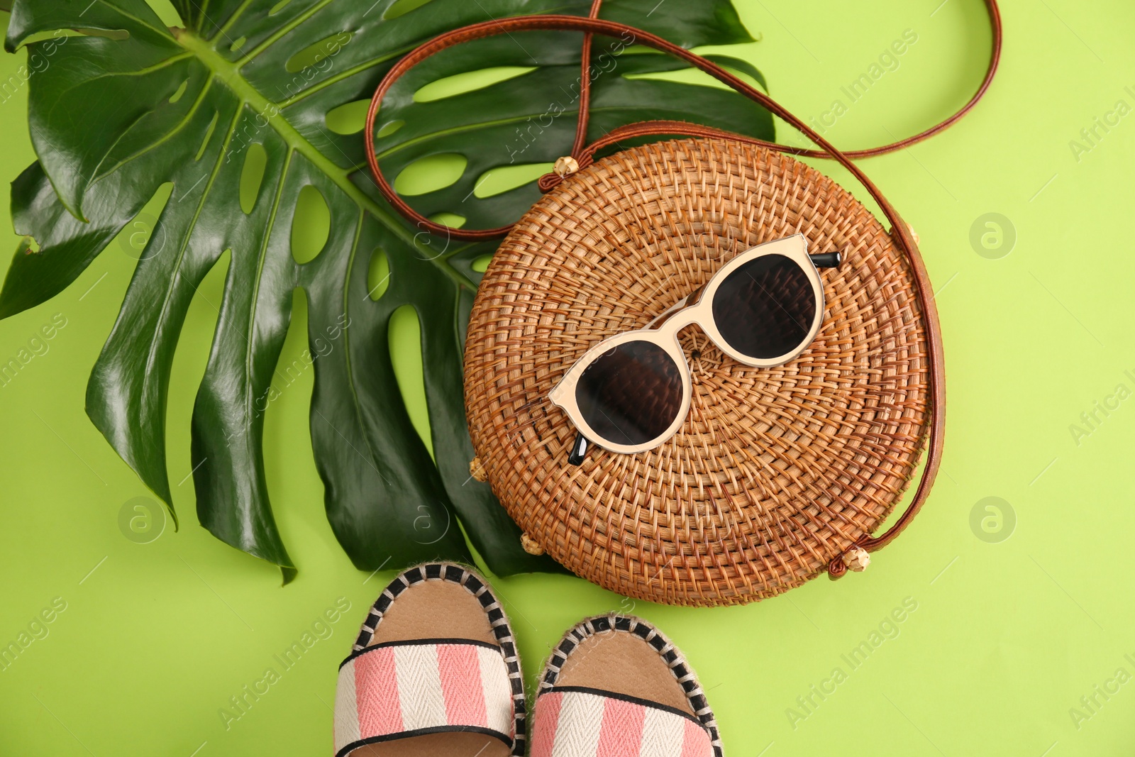 Photo of Flat lay composition with bamboo bag on color background