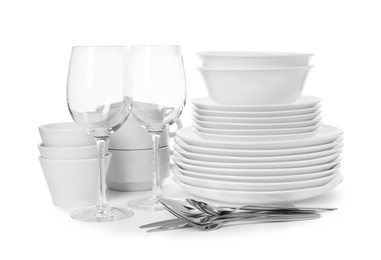 Set of clean tableware on white background. Washing dishes