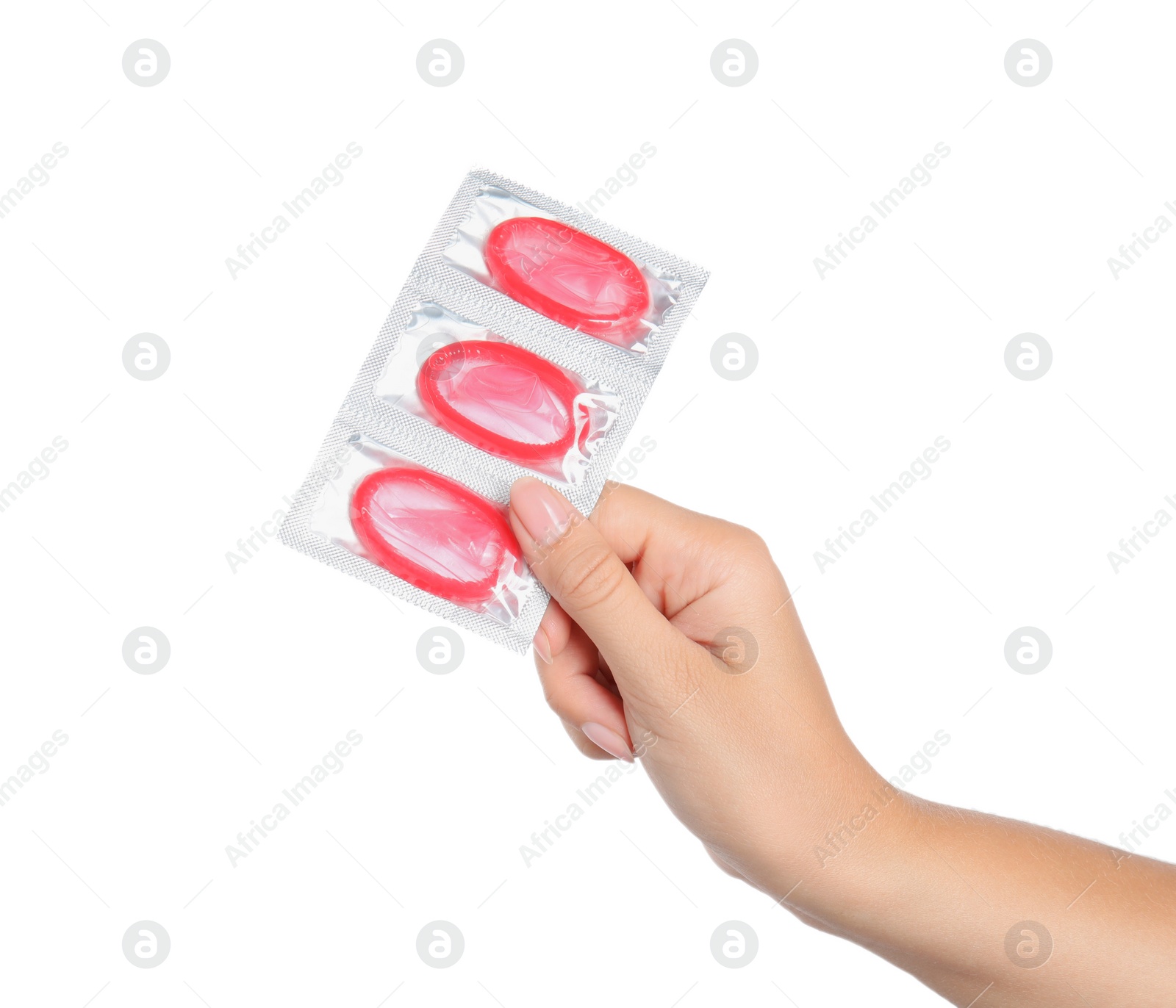 Photo of Woman holding condoms on white background, closeup