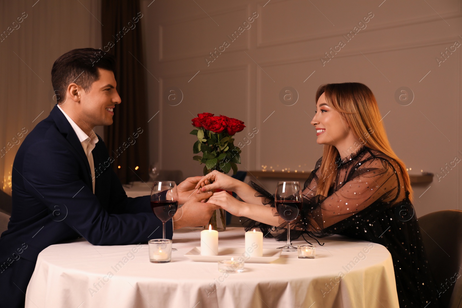 Photo of Lovely couple having romantic dinner in restaurant